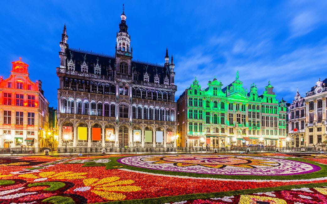 Belgium's Grand Place illuminated at night in multicolour