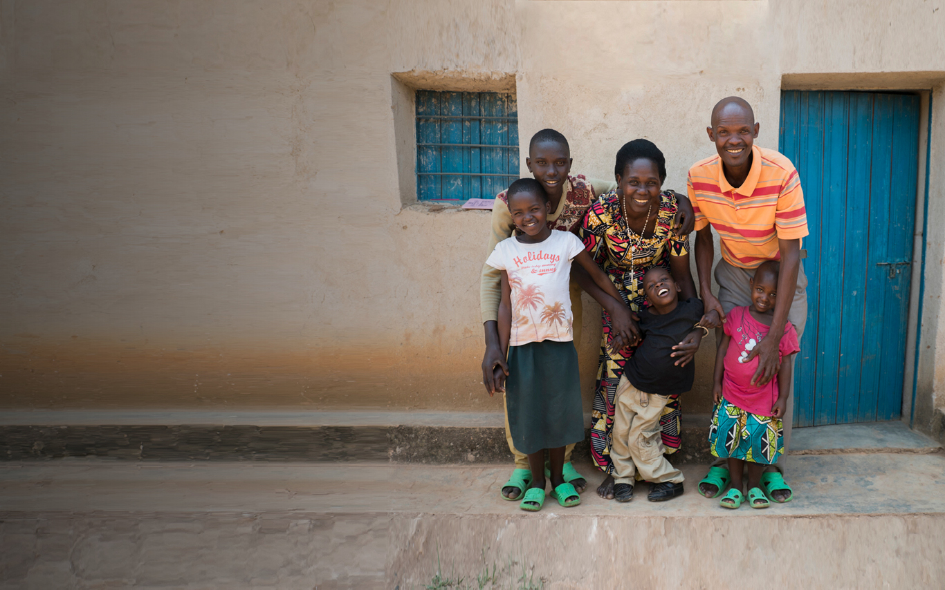 Rwanda, a family standing outside