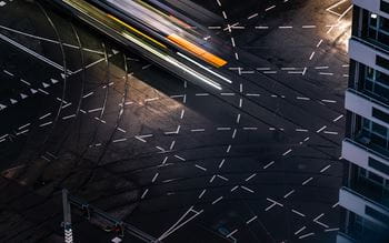 Aerial view of traffic intersection with intersecting lines