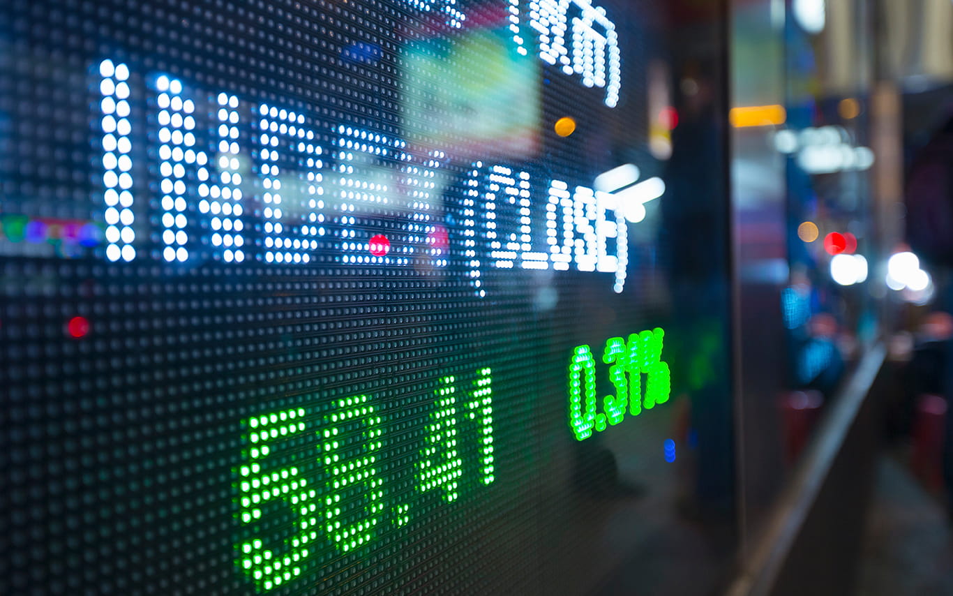 LCD stock exchange screen showing the words index and close