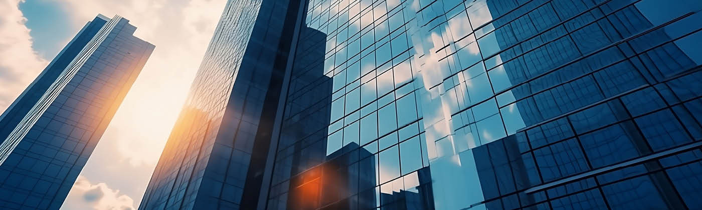 Modern skyscrapers against a blue cloudy sky