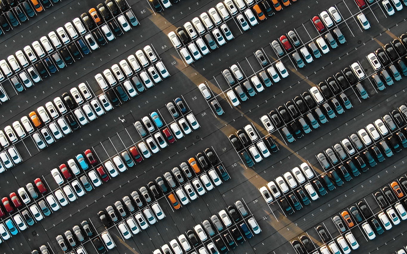 Aerial view of parking lot with a lot of traffic