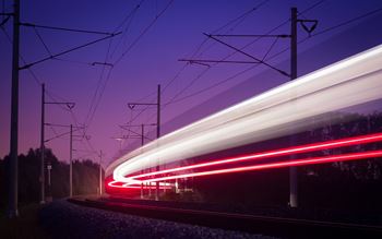 A train moving at high speed at night