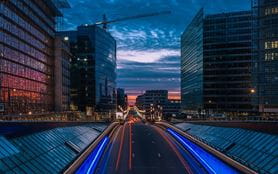 A road in Brussels illuminated at night