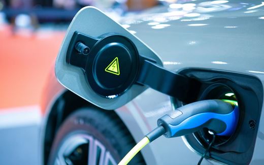 An electric car recharging