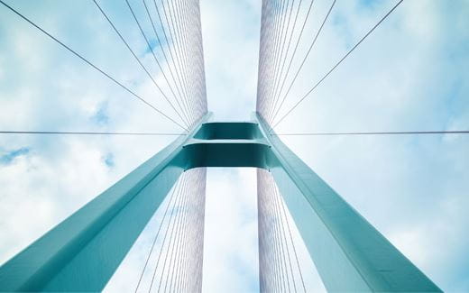 Image of suspension bridge against blue sky