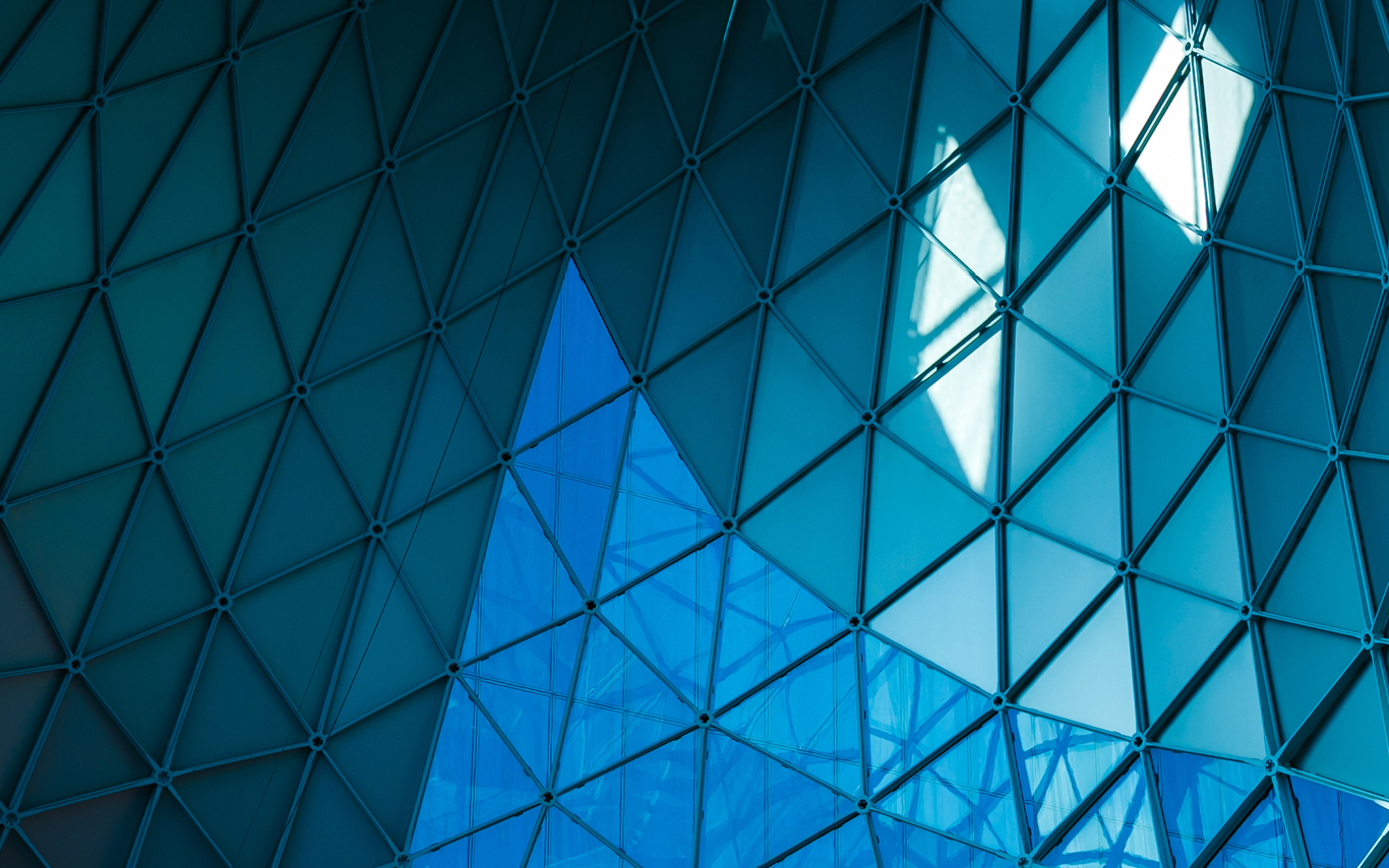 Close up of a blue glass building