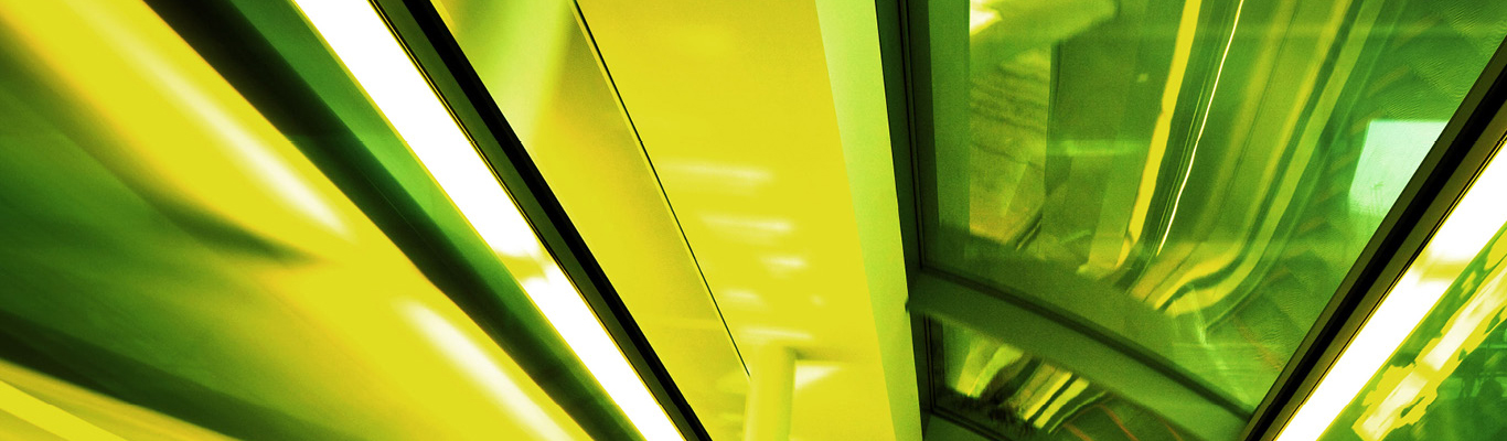 bright green image of escalator 