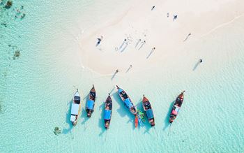 Aerial view of boats on beach