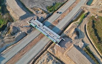Aerial view on building site of road bridge for city road bypass
