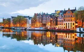 Image of Amsterdam canal and buildings