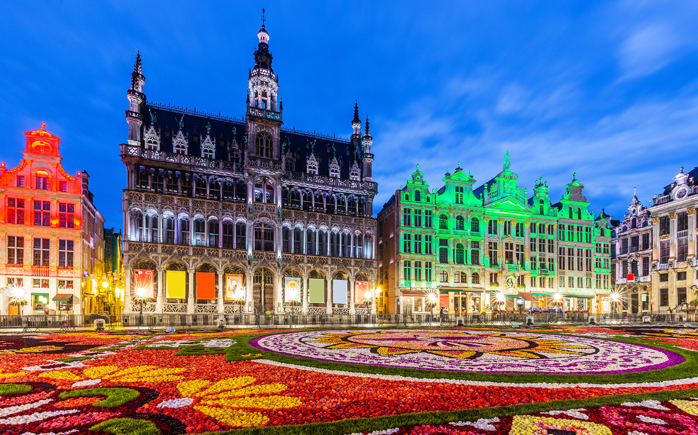 Belgium's Grand Place illuminated at night in multicolour