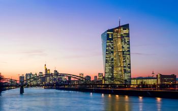 ECB building and Frankfurt skyline at dusk