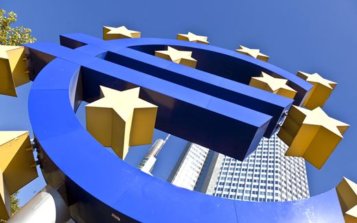large Euro sign on blue sky