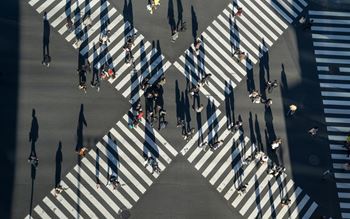 People using crosswalks
