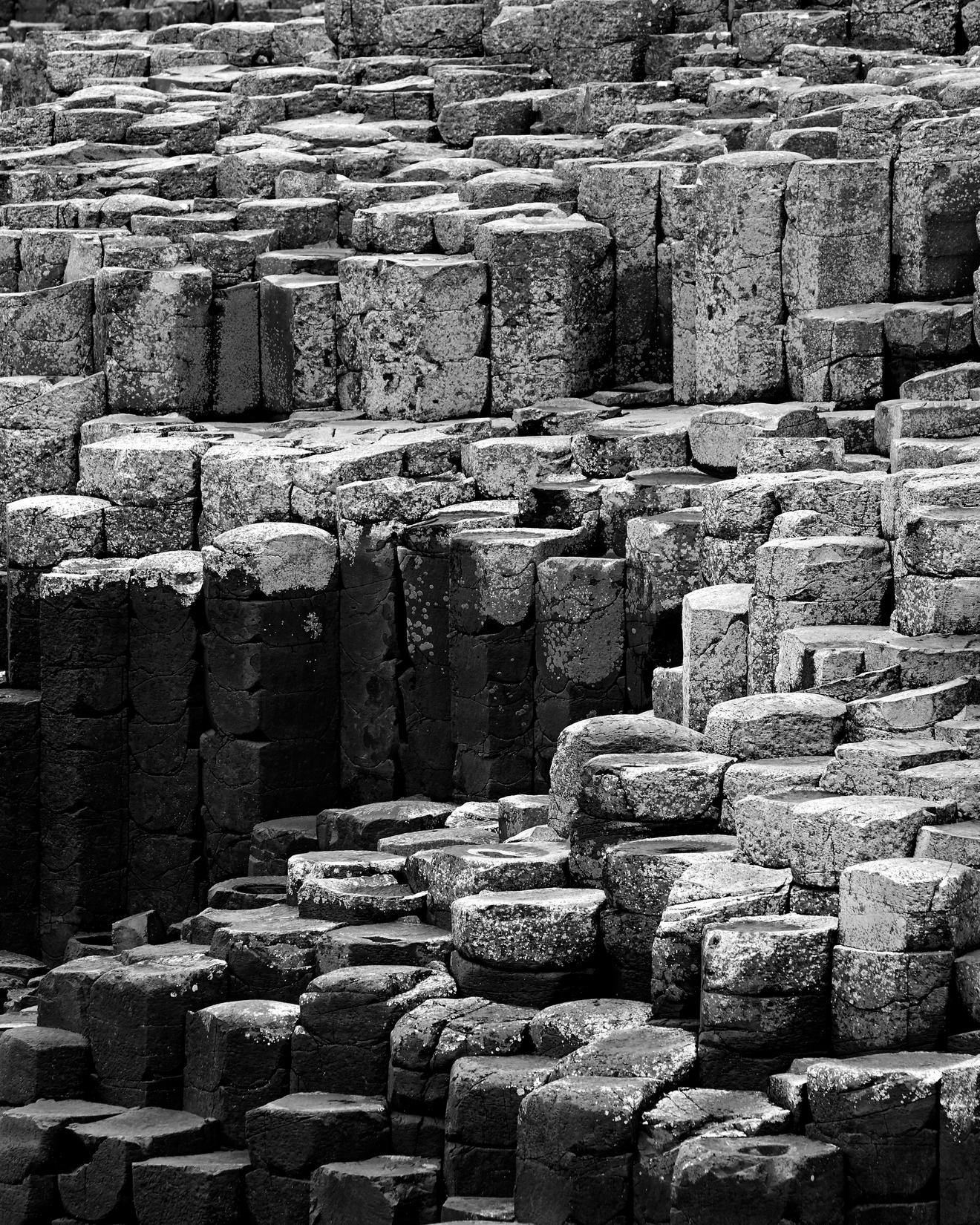 Black and white image of the stones of the Giants Causeway in Ireland